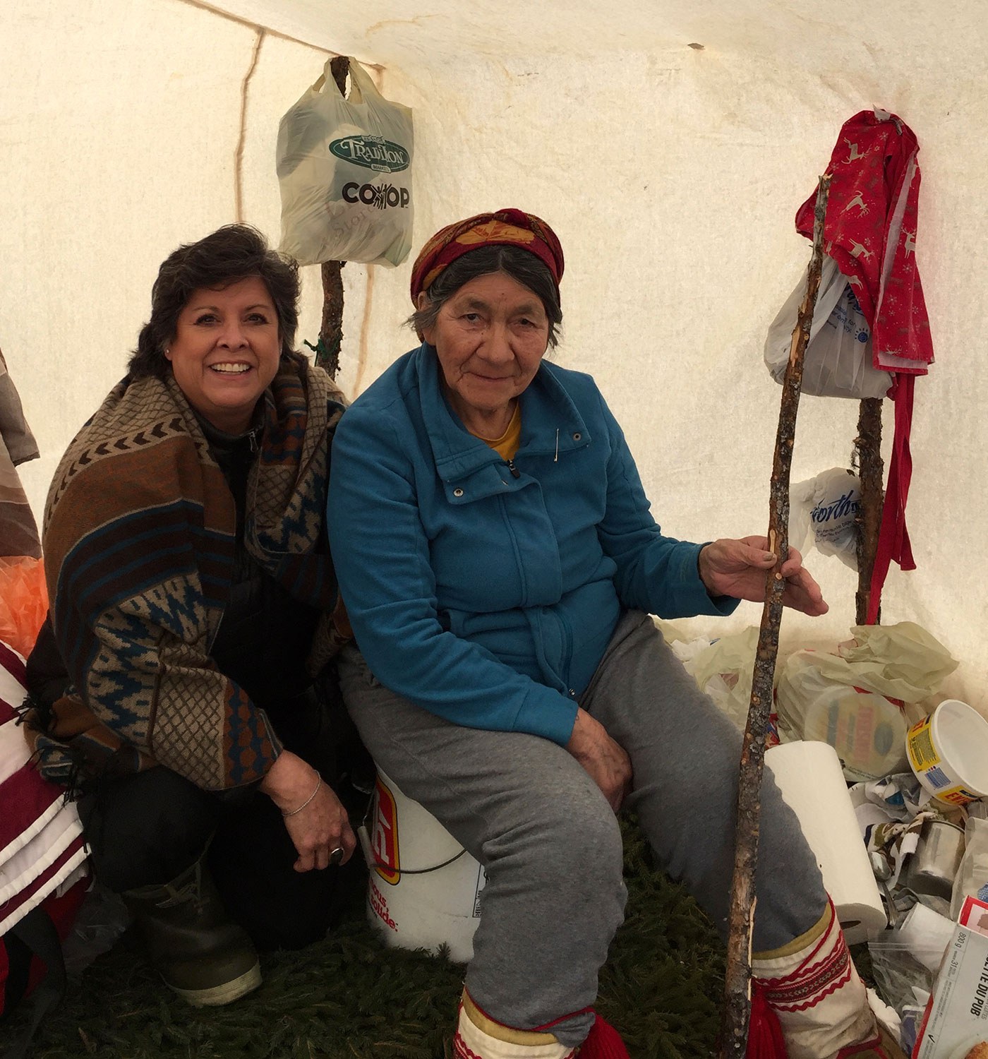 Dr. Wesley-Esquimaux (left) with Elizabeth Penashue, who was born into an Innu hunting and trapping family that lived at Kanekuanikat, between Esker and Churchill Falls, Labrador. Penashue moved to Sheshatshiu in the 1960s when her family and her people were encouraged to relocate in order to integrate them into Canadian society through education and a more settled lifestyle. Photo courtesy of the author.