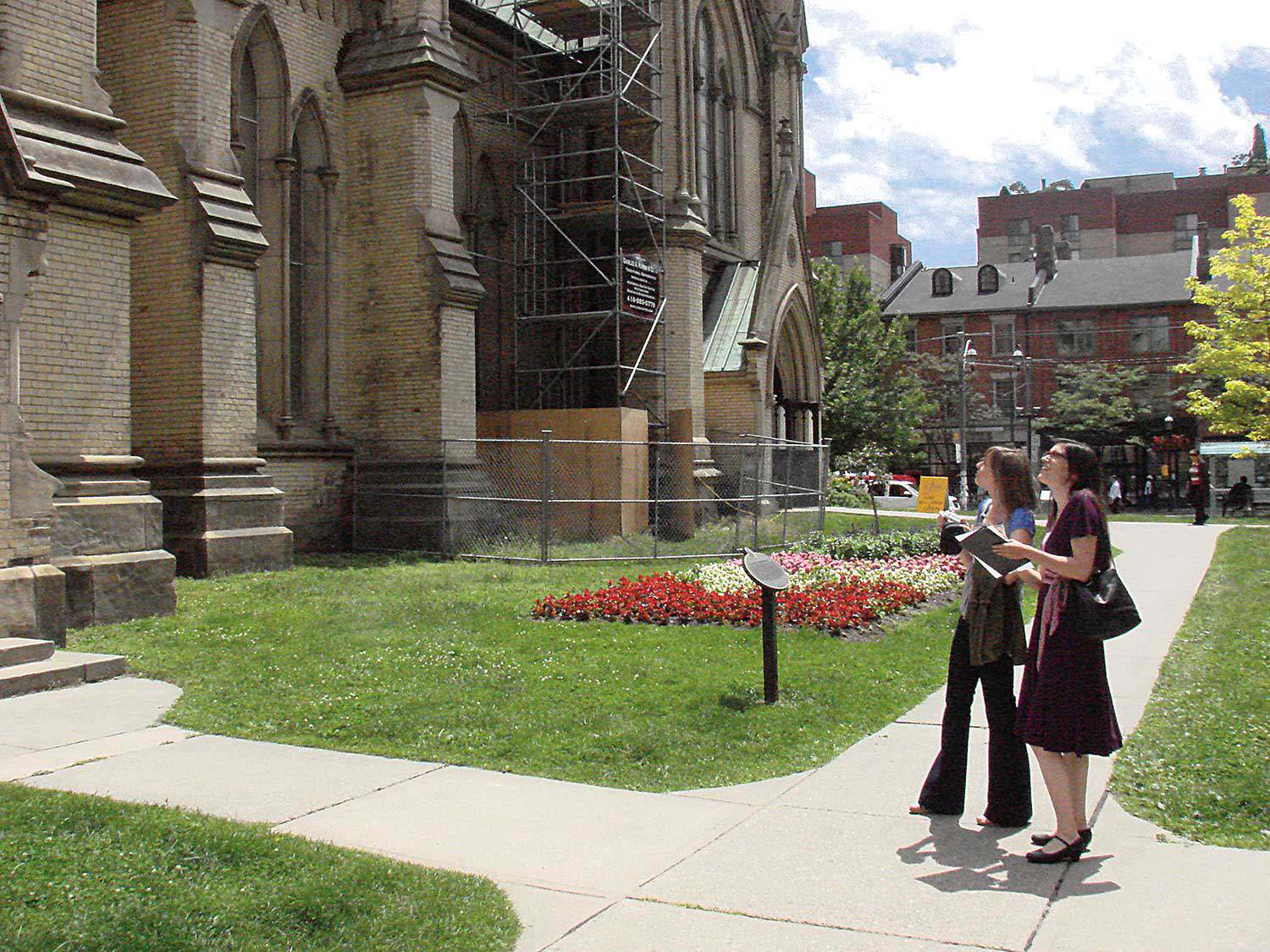 Trust Researcher Erin Semande (left) and planner Laura Hatcher conducting fieldwork for Ontario’s Places of Worship Inventory.