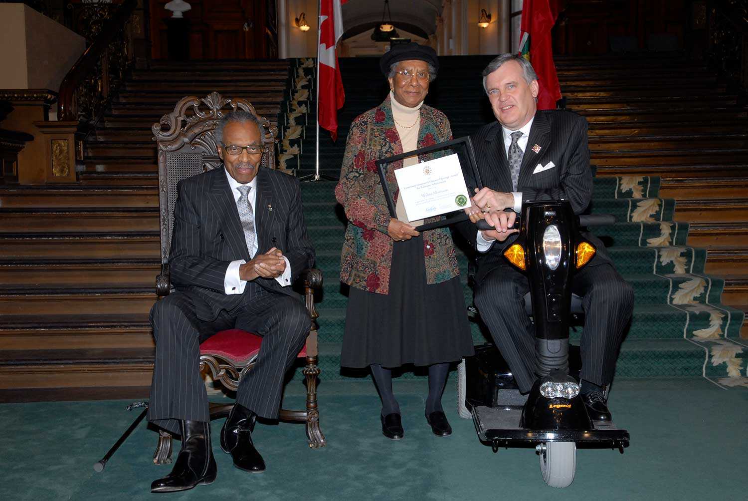 Wilma Morrison received a Lieutenant Governor’s Ontario Heritage Award for Lifetime Achievement in 2007 from the Ontario Heritage Trust, presented by The Honourable Lincoln M. Alexander (left) and The Honourable David C. Onley, Lieutenant Governor of Ontario.