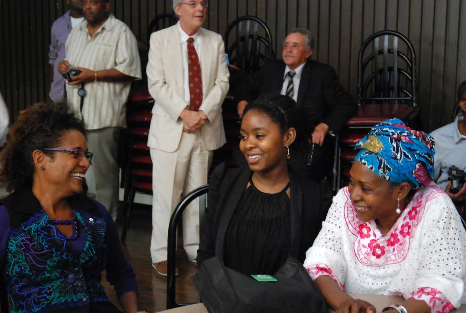 Former Governor General Michaëlle Jean shares a moment with Dr. Afua Cooper (right) and her daughter Habiba Diallo (centre) at the Harriet Tubman Institute event on August 27, 2011.