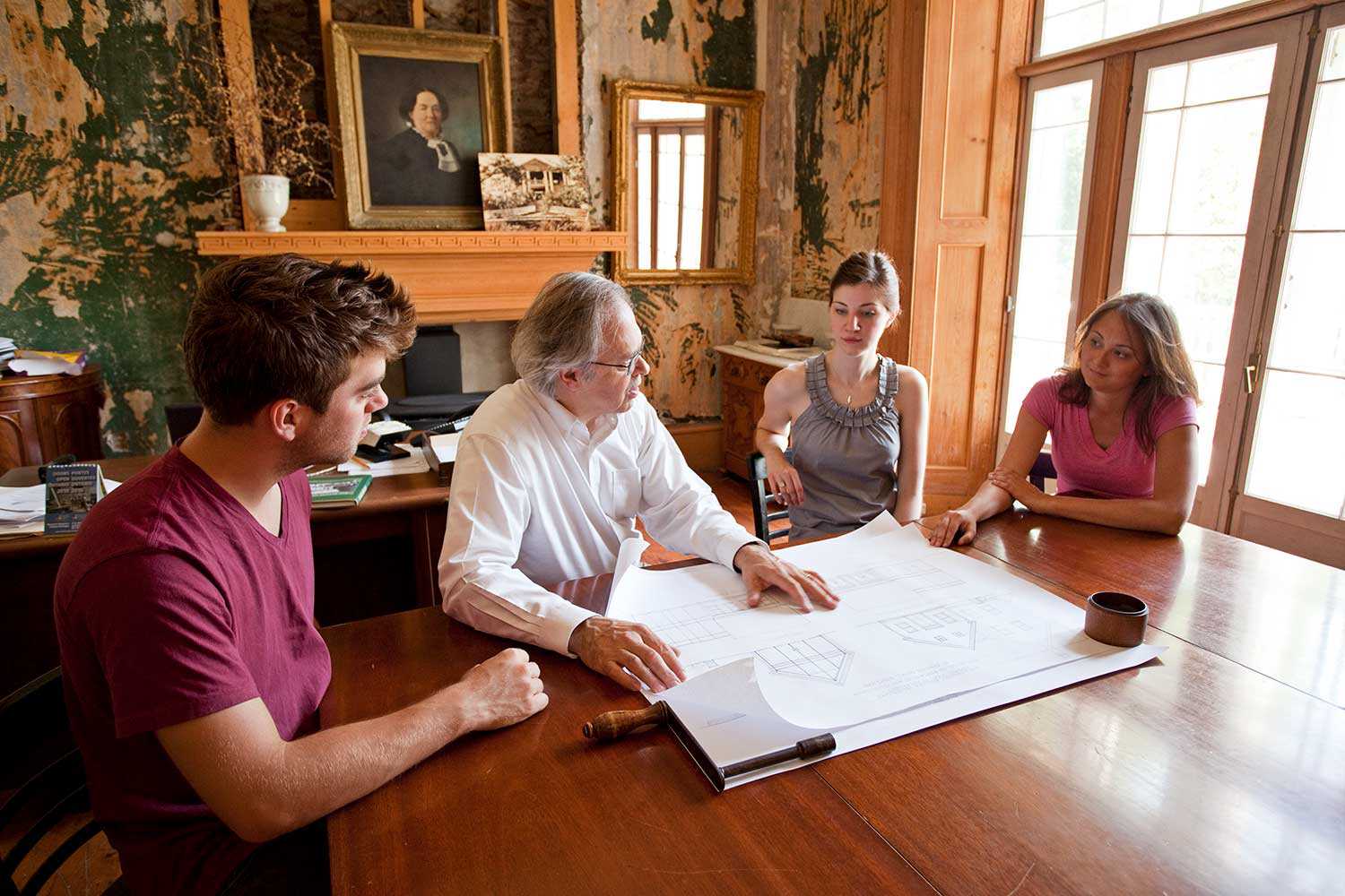 Executive Director Julian Smith reviews design proposals with Heritage Conservation Program students (Photo courtesy of Willowbank School of Restoration Arts)